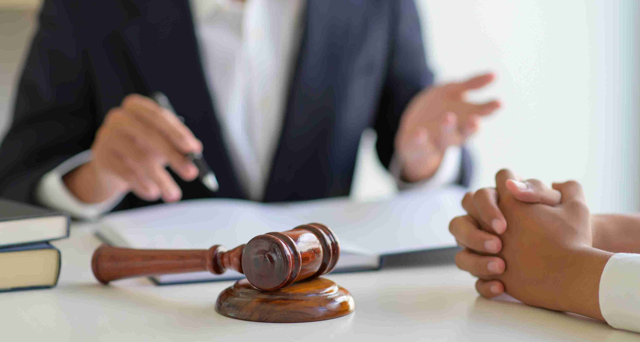 Lawyer giving advice to clients.