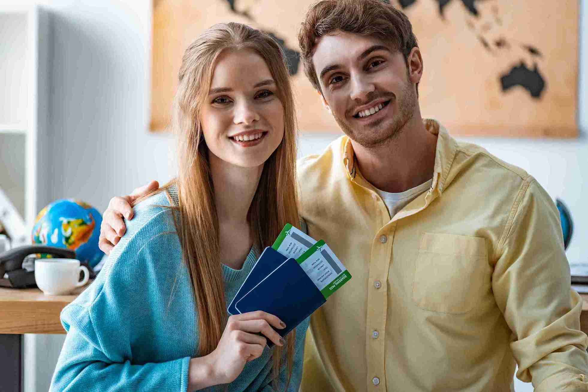 Smiling couple enjoying on approval of their Fiancé visa.