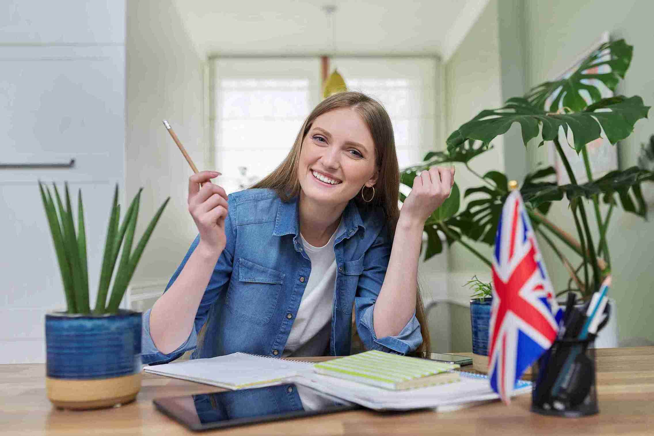 Female student learning online illustrating high potential individual visa.