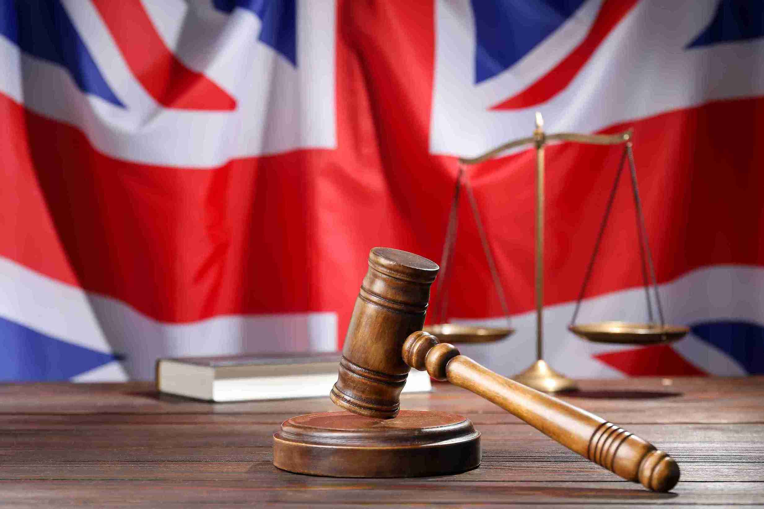 Wooden judges gavel showing justice and law.